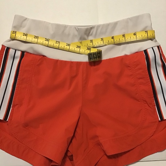 Athleta Ascender Athletic Shorts Orange - Picture 5 of 9